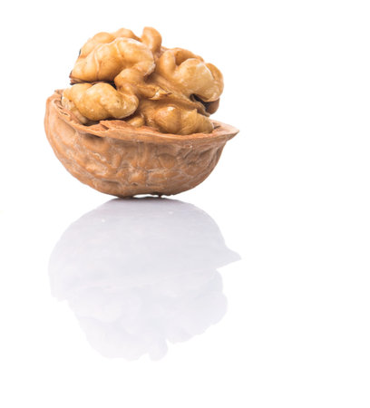 Walnut nuts over white background