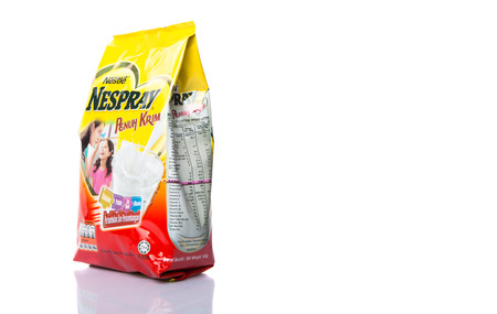 KUALA LUMPUR, MALAYSIA - MARCH 11TH 2015. Also known as Nido, Nespray full cream milk is a brand of powdered milk manufactured by Nestle S.A, a Swiss multinational food and beverage company.のeditorial素材
