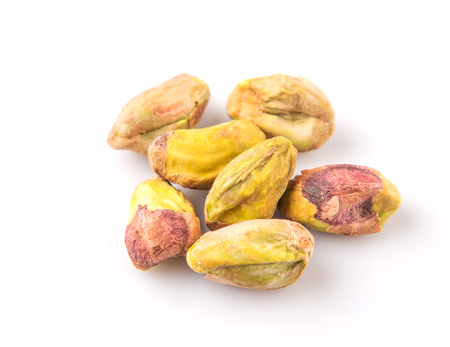 Pistachio nuts over white backgroundの写真素材
