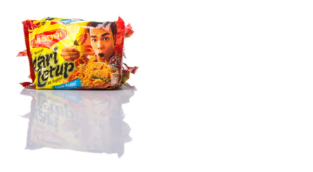 KUALA LUMPUR, MALAYSIA - MARCH 15TH 2015. Maggi instant noodles. Owned by Nestle, Maggi is an international brand of soups, stocks, bouillon cubes, ketchups, sauces, seasonings and instant noodles.のeditorial素材