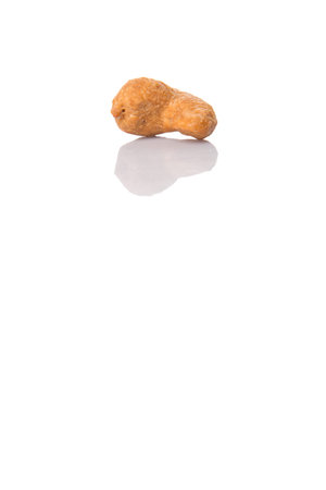 Roasted and salted cashew nut over white background