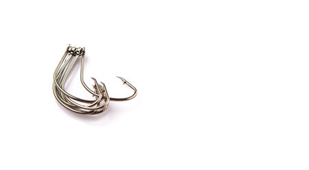 Fish hook over white background