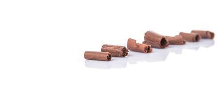 Chocolate curls over white backgroundの写真素材