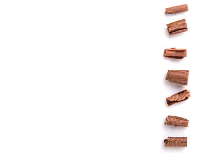 Chocolate curls over white backgroundの写真素材