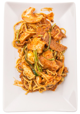 Popular Malaysian salad Rojak Pasembur consisting of shredded cucumber, potatoes, beancurd, turnip, bean sprouts and mix seafoods with a sweet and spicy nut sauce.の写真素材