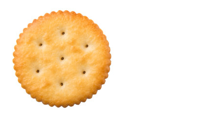 Round salted cracker over white background
