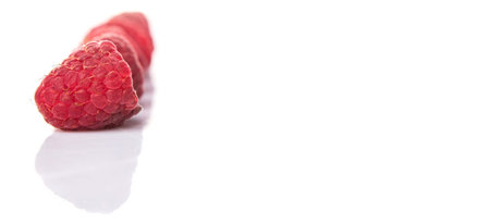 Raspberry fruit over white backgroundの写真素材