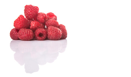 Raspberry fruit over white backgroundの写真素材