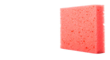 Red dish washing sponge over white backgroundの写真素材