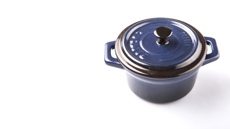 Mini blue empty cocotte single pot over white backgroundの写真素材