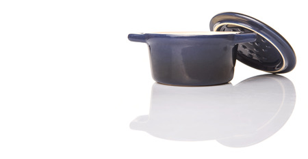 Mini blue empty cocotte single pot over white backgroundの写真素材