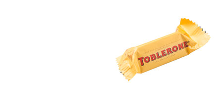 KUALA LUMPUR, MALAYSIA - APRIL 22ND, 2015. Created by Theodor Tobler in 1908,  Toblerone is a Swiss triangular chocolate bar brand owned by American Mondelez International.のeditorial素材