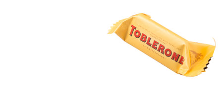 KUALA LUMPUR, MALAYSIA - APRIL 22ND, 2015. Created by Theodor Tobler in 1908,  Toblerone is a Swiss triangular chocolate bar brand owned by American Mondelez International.のeditorial素材
