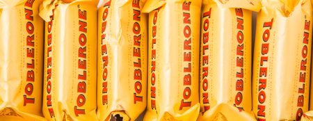 KUALA LUMPUR, MALAYSIA - APRIL 22ND, 2015. Created by Theodor Tobler in 1908,  Toblerone is a Swiss triangular chocolate bar brand owned by American Mondelez International.のeditorial素材