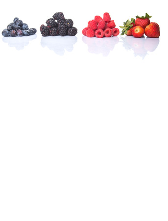 Strawberry, blackberry, blueberry and raspberry over white backgroundの写真素材