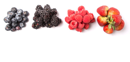 Strawberry, blackberry, blueberry and raspberry over white backgroundの写真素材