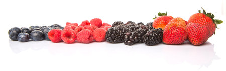 Strawberry, blackberry, blueberry and raspberry over white background