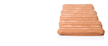 Chocolate coated finger biscuit over white backgroundの写真素材
