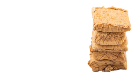 Homemade fried tofu over white backgroundの写真素材