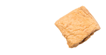 Homemade fried tofu over white backgroundの写真素材