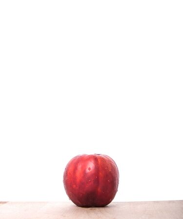Nectarine fruit on wooden surfaceの写真素材