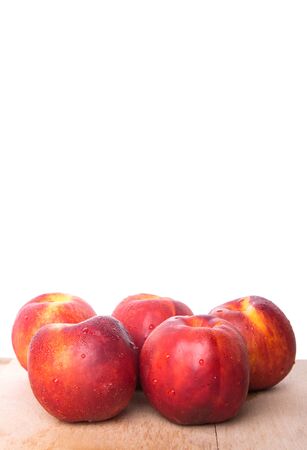 Nectarine fruit on wooden surfaceの写真素材