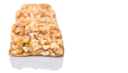 Caramelized candy nuts over white backgroundの写真素材