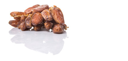 Date fruits over white background