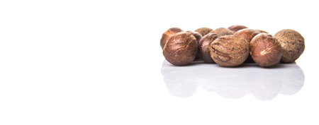 Nutmeg over white background