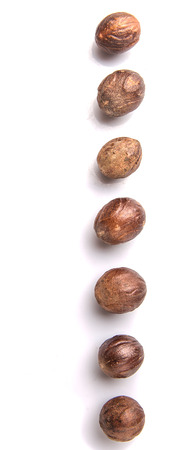 Nutmeg over white backgroundの写真素材