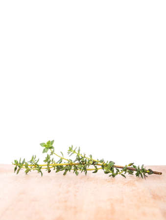 Thyme herbs leaves over wooden surfaceの写真素材