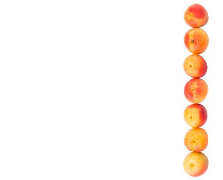 Ripe apricot over white backgroundの写真素材