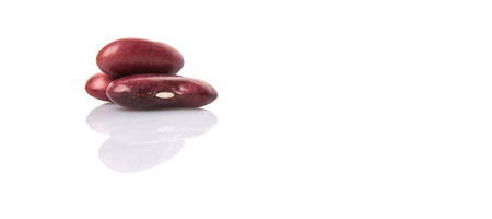 Red kidney beans over white backgroundの写真素材