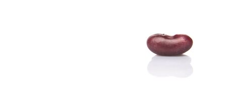 Red kidney beans over white backgroundの写真素材