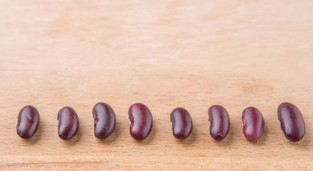Red kidney beans on wooden backgroundの写真素材