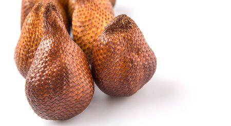 Salak fruit or snake fruits over white backgroundの写真素材