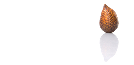 Salak fruit or snake fruits over white backgroundの写真素材