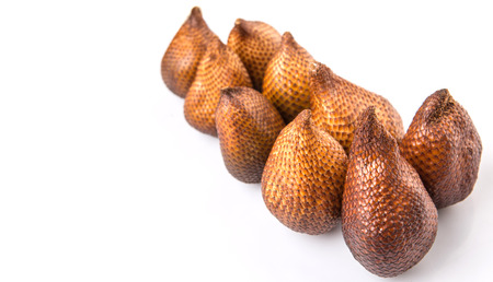 Salak fruit or snake fruits over white backgroundの写真素材