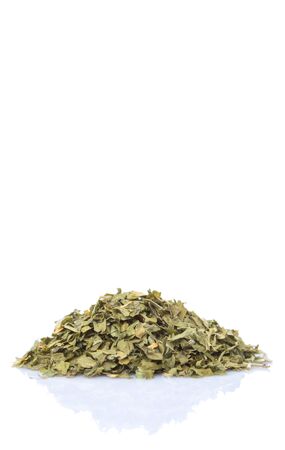 Dried parsley herbs over white backgroundの写真素材