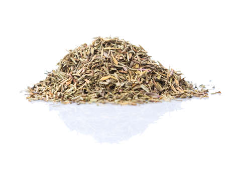Dried thyme herbs over white backgroundの写真素材