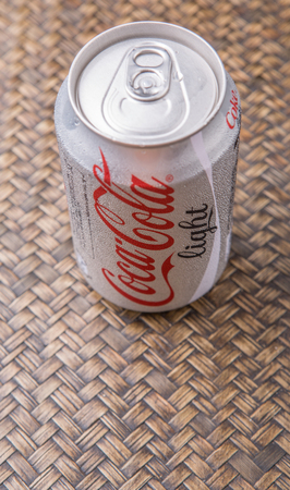 PUTRAJAYA MALAYSIA  JUNE 28TH 2015. Coca Cola Diet on wicker background. Coca Cola drinks are produced and manufactured by The CocaCola Company an American multinational beverage corporation.のeditorial素材