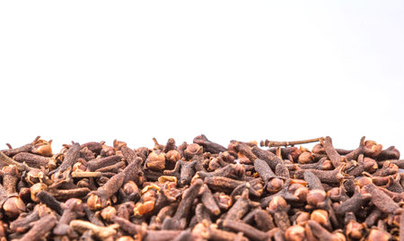 Clove spices over white background