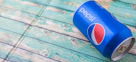 PUTRAJAYA, MALAYSIA - JULY 5TH, 2015. Pepsi can on weathered wood. Pepsi is a carbonated soft drink...