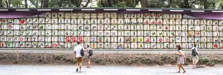 TOKYO, JAPAN - AUGUST 16TH 2015.Traditional donated sake barrels at Meiji Shrine in Shibuya, Tokyo.のeditorial素材