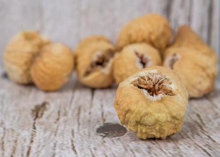 Dried fig over rustic wooden backgroundの写真素材