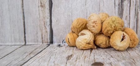 Dried fig over rustic wooden backgroundの写真素材