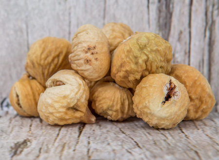 Dried fig over rustic wooden backgroundの写真素材