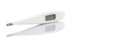 Medical thermometer over white background