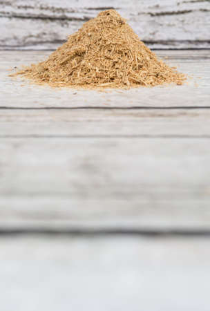Lemongrass powder over wooden backgroundの写真素材