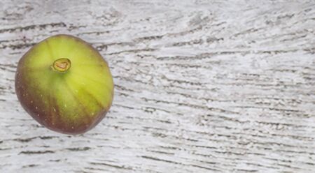 Fig fruits over wooden backgroundの写真素材